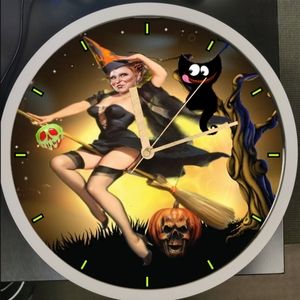 Winifred showing off her Cat Halloween clock